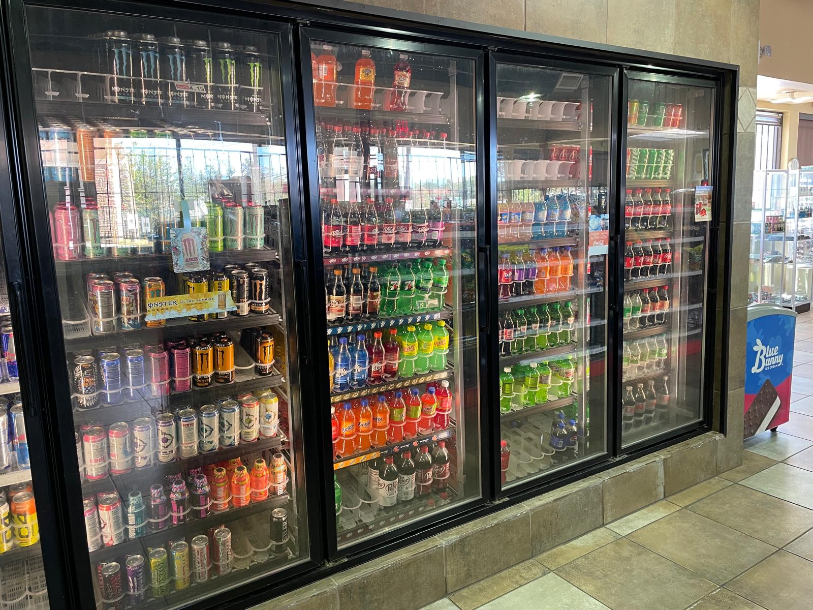 ZSM Express organized snack aisles with wide variety of products and modern red fixtures